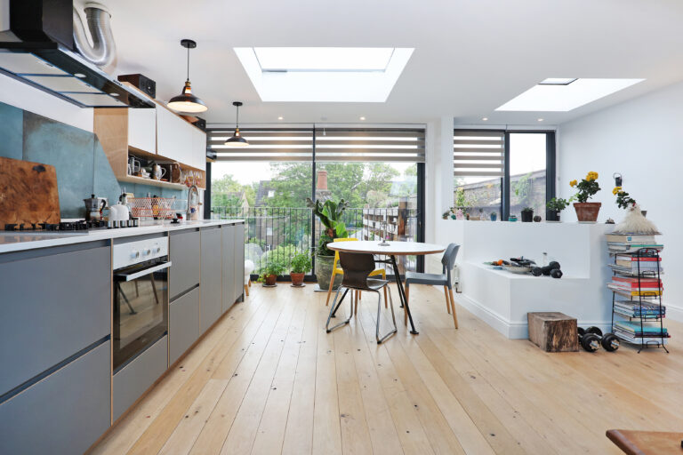 Kitchen and dining area beneath rooflights — Kensal Green NW10