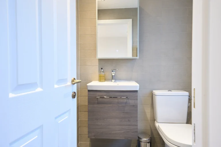 Modern bathroom with sink and toilet — Chiswick W4