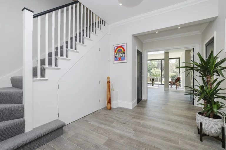 Modern hallway with stairs and plant — Sheen SW14