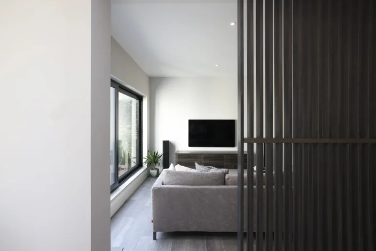 Modern living room with sofa and TV — Sheen SW14