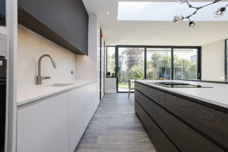 Modern kitchen with large windows and island — Sheen SW14