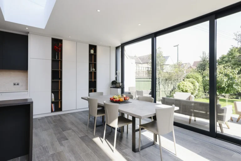Modern dining area with large windows — Sheen SW14