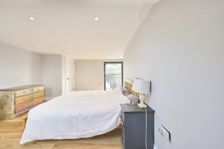Modern bedroom with double bed and dresser — Kennington SE17