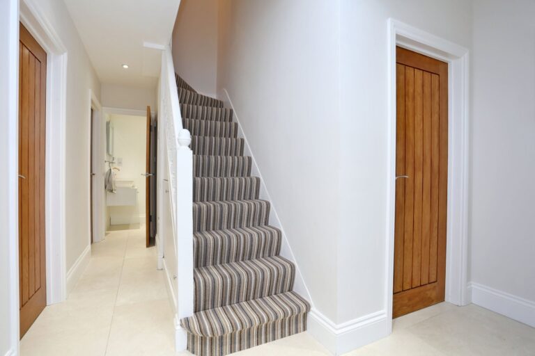 Modern hallway with striped carpet staircase β Morden SM4