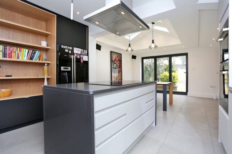 Modern kitchen with skylights and island — Brentford TW8