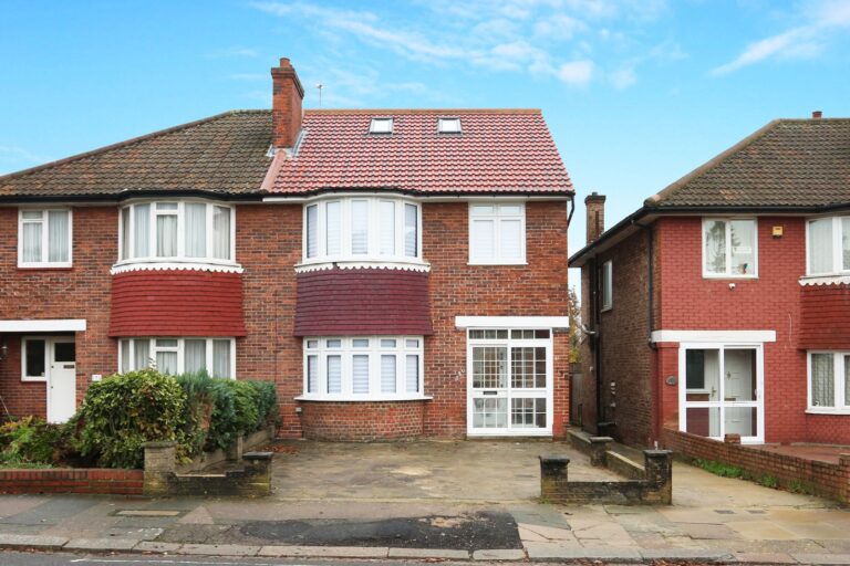 Red-brick townhouse with driveway and shrubs — Acton W3