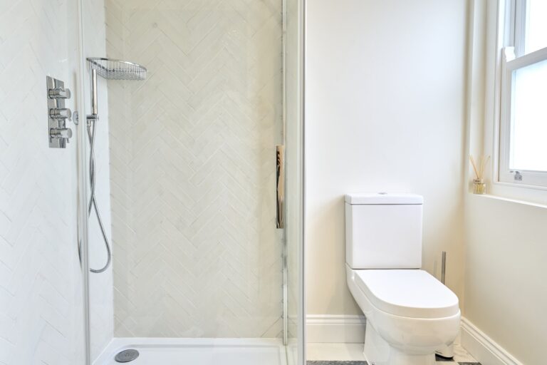 Modern bathroom with shower and toilet — Balham SW12