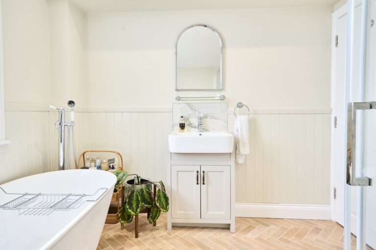 Modern bathroom with bathtub and sink — Balham SW12
