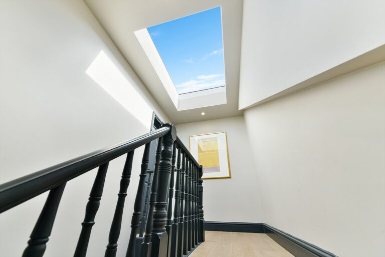 Bright staircase with skylight and framed art — Kensal Rise NW10