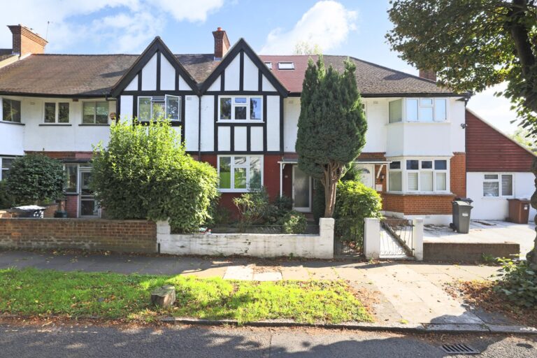 White and brown townhouse with garden and trees — Acton W3