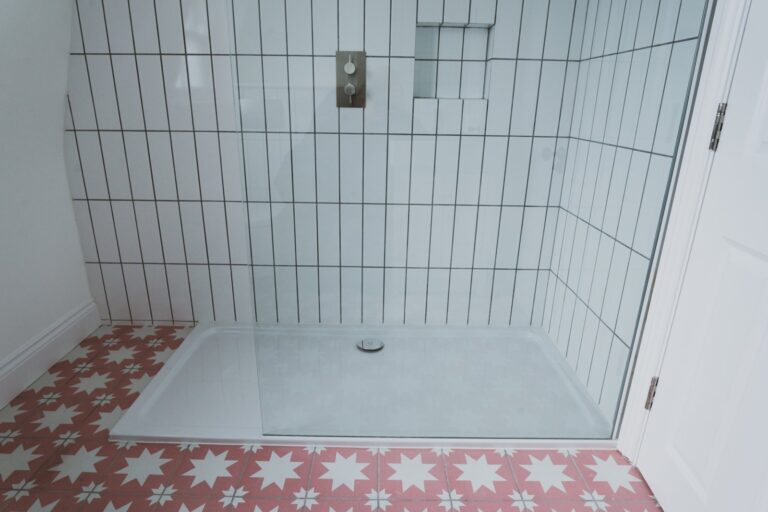 Modern shower with geometric tile design — Fulham SW6