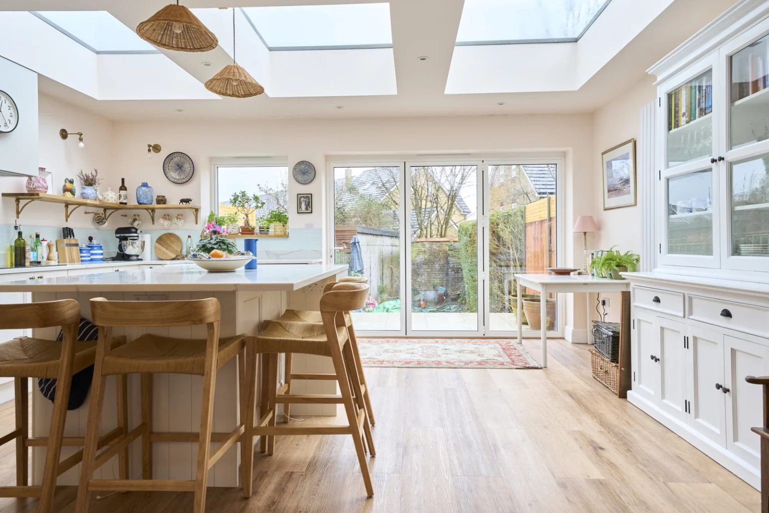 Bright farmhouse kitchen with large windows and island — Earlsfield SW18