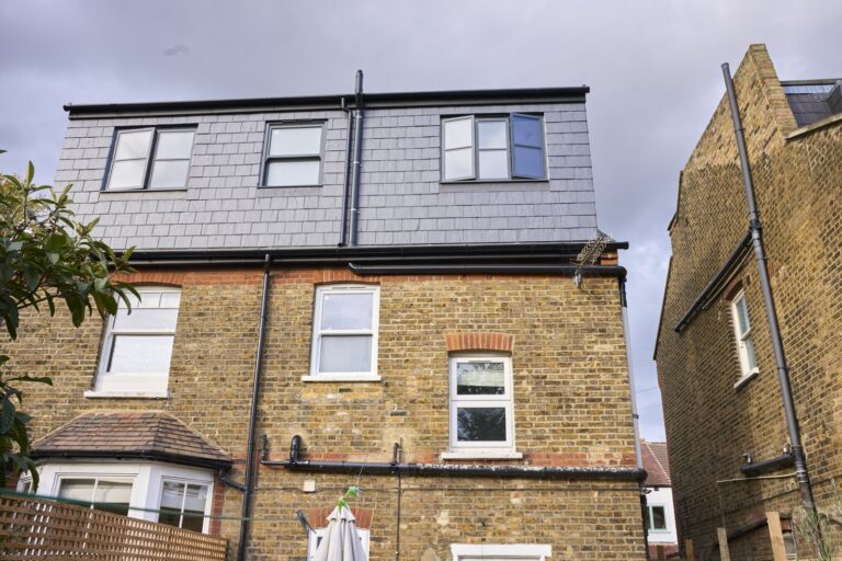 Modern brick house with dormer windows — Acton W3