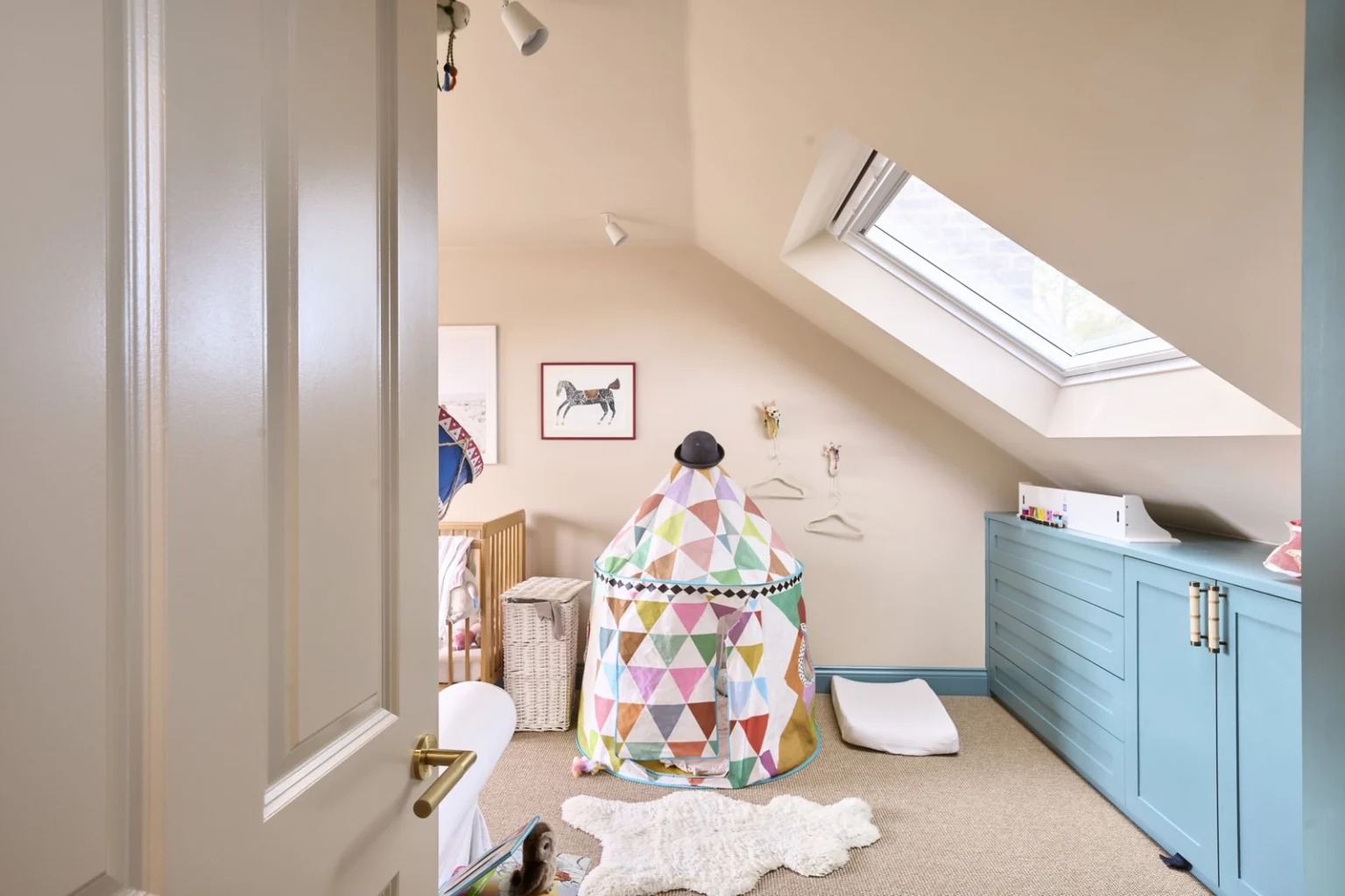Cosy loft nursery with skylight and play tent — Acton W3