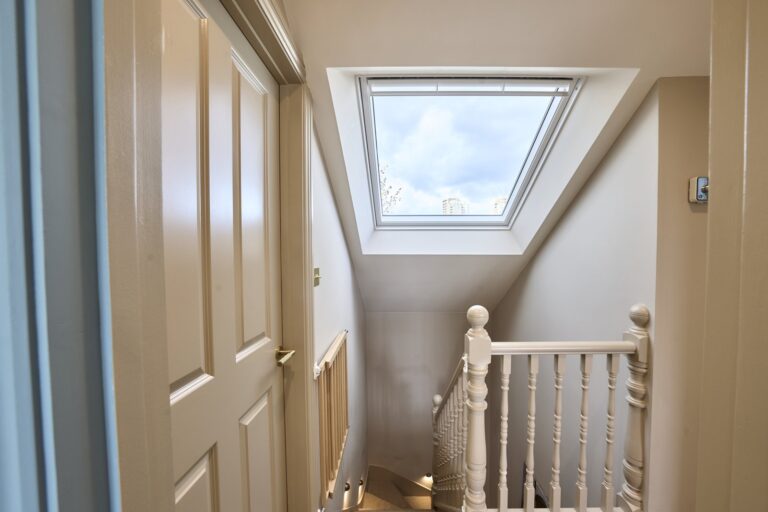 Bright staircase with skylight above — Acton W3